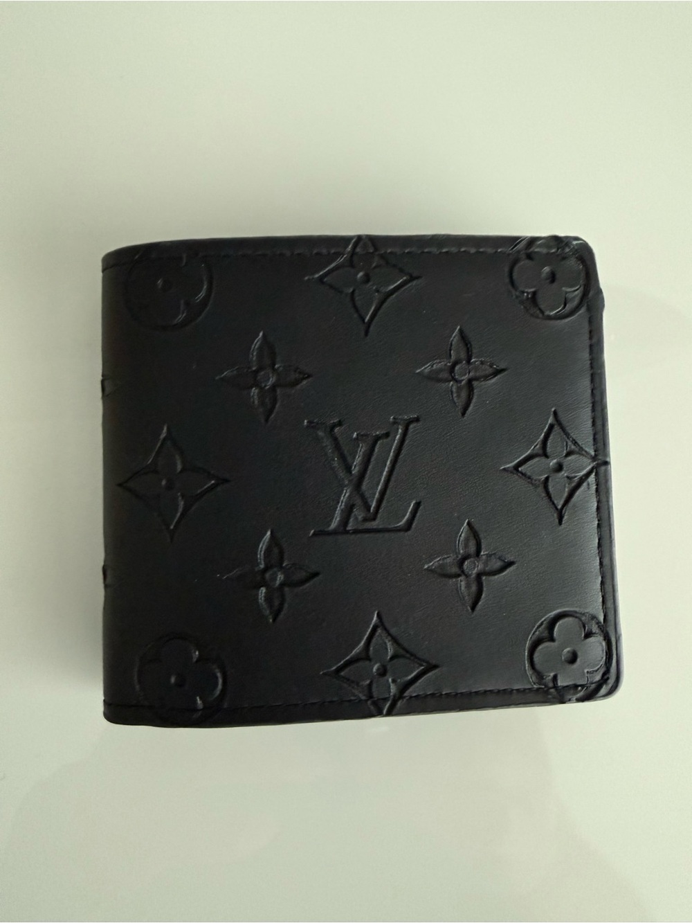 Louis Vuitton Black Leather Embossed Monogram Bifold Wallet